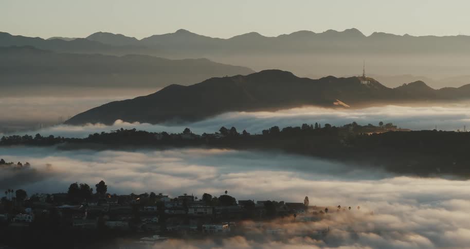 A landscape above the clouds with huge hills