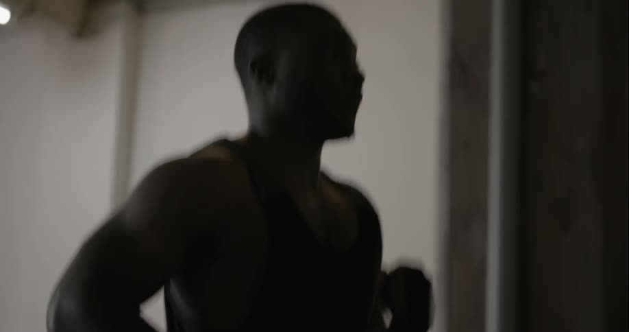 A man is running on a treadmill