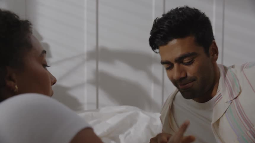 Young couple having a playful moment in the bed