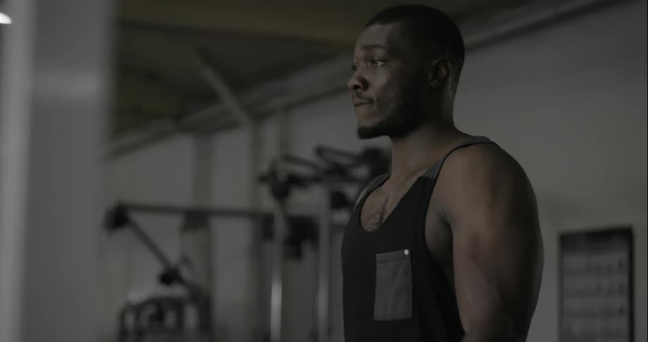 A man is lifting barbells