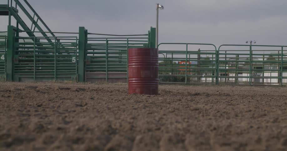 Red barrel on the middle of a rodeo
