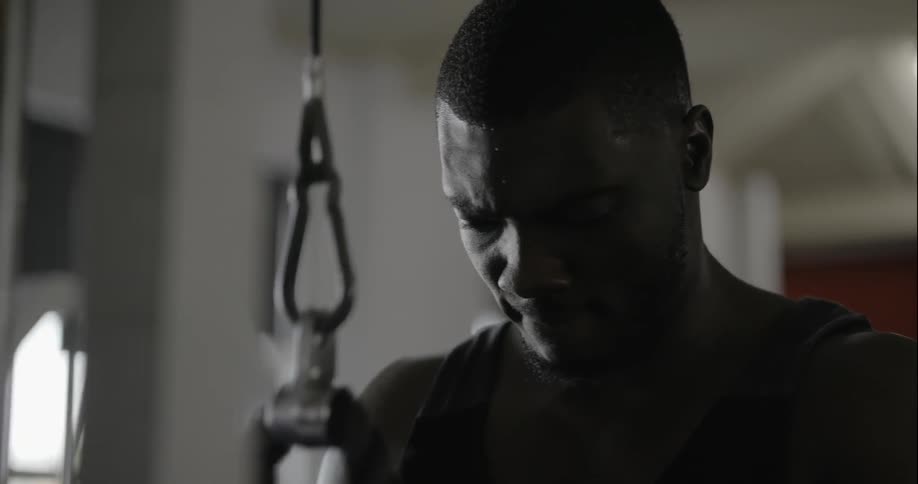 A man is working out in a gym