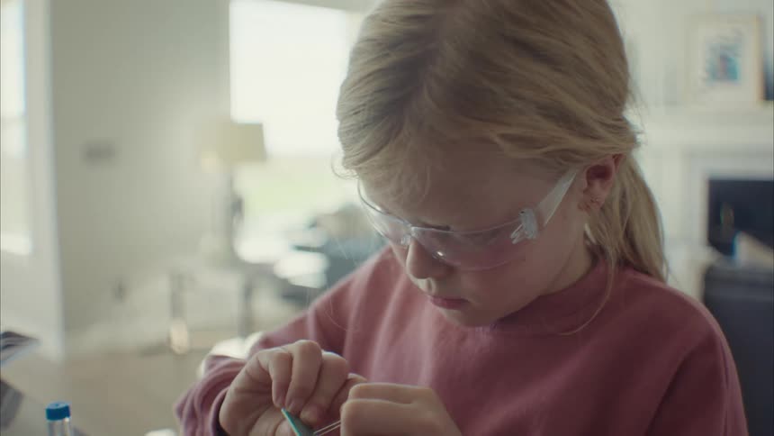 A little blonde girl building a hardwater skin