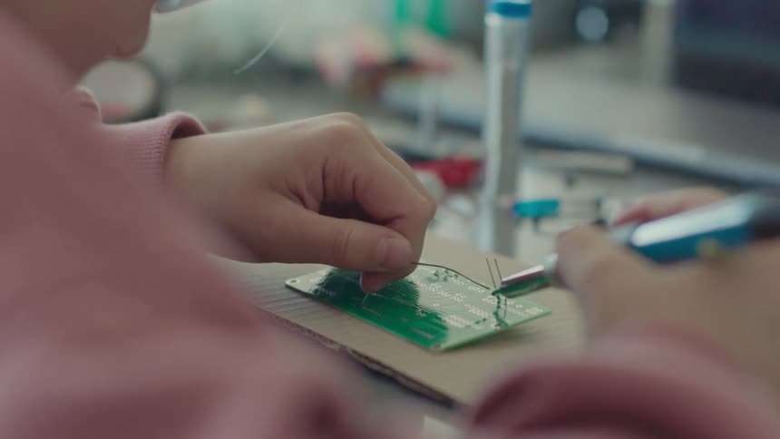A clip of a person repairing a panel