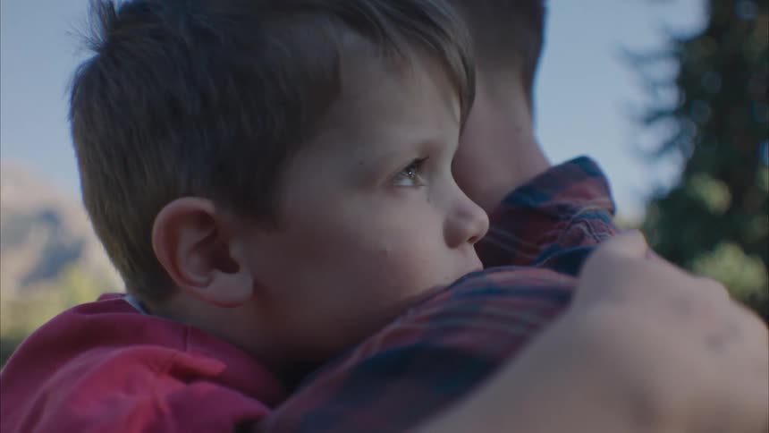 Father and son hugging at morning