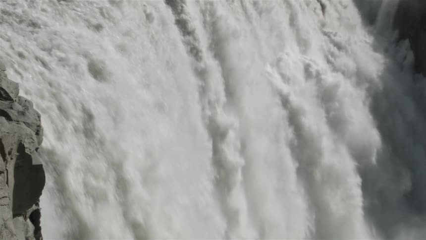 Powerful waters rushing down a waterfall