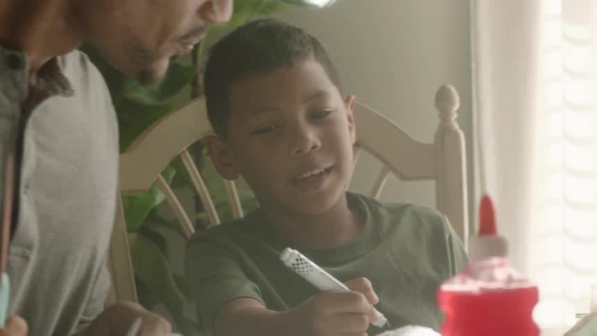 A father and his kids learning and having a conversation
