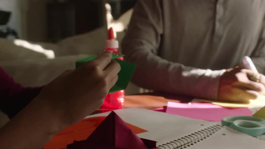 Brother and sister doing and arts and crafts project