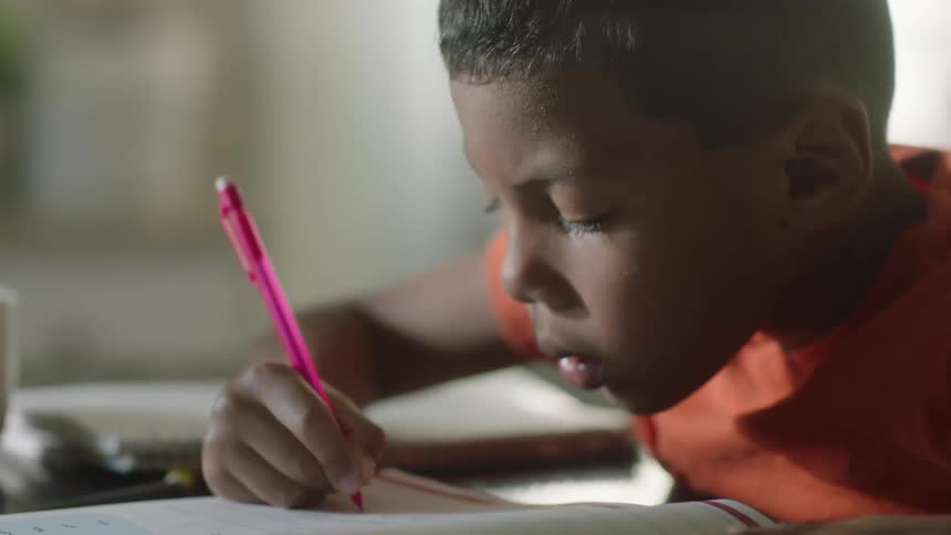 A child is doing his homework