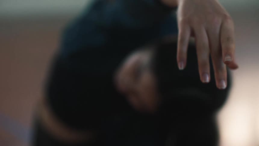 Close up of a ballet dancers hand dancing