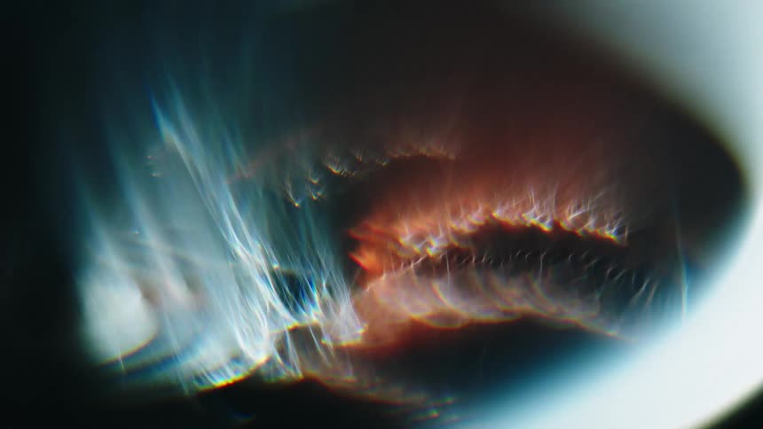 Electric engine spinning while light reveals the stator inside
