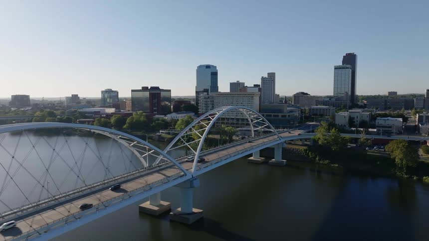 Aerial of the bridge over the river in the metropolitan city