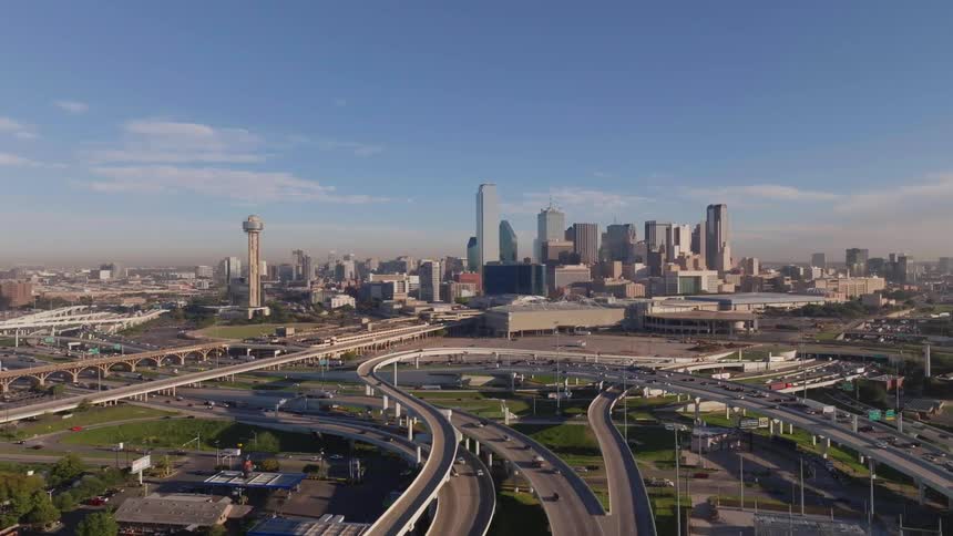 Aerial animation of a city with a bus station and terminal during the day