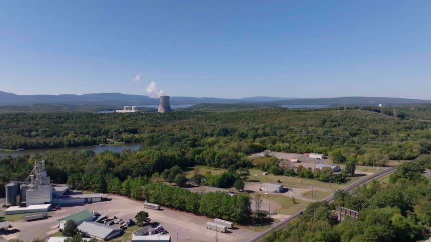 A power plant sits by the small town