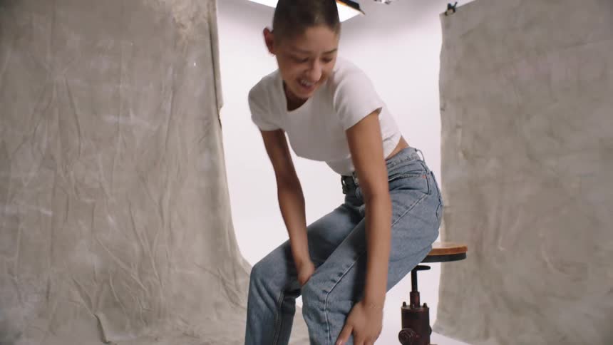 A woman in a fashion photoshoot