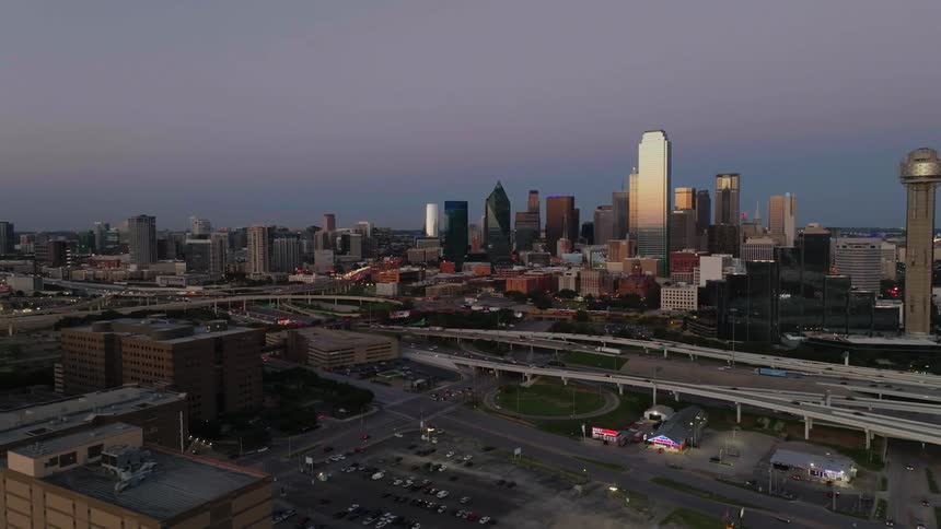 The sun is setting on the city