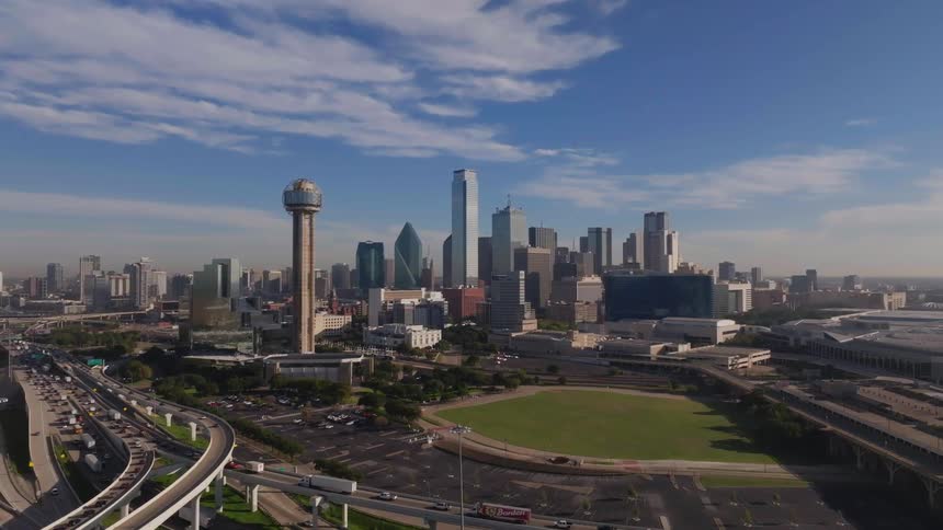Landscape of bridges buildings and moving cars in a metropolitan area during the day