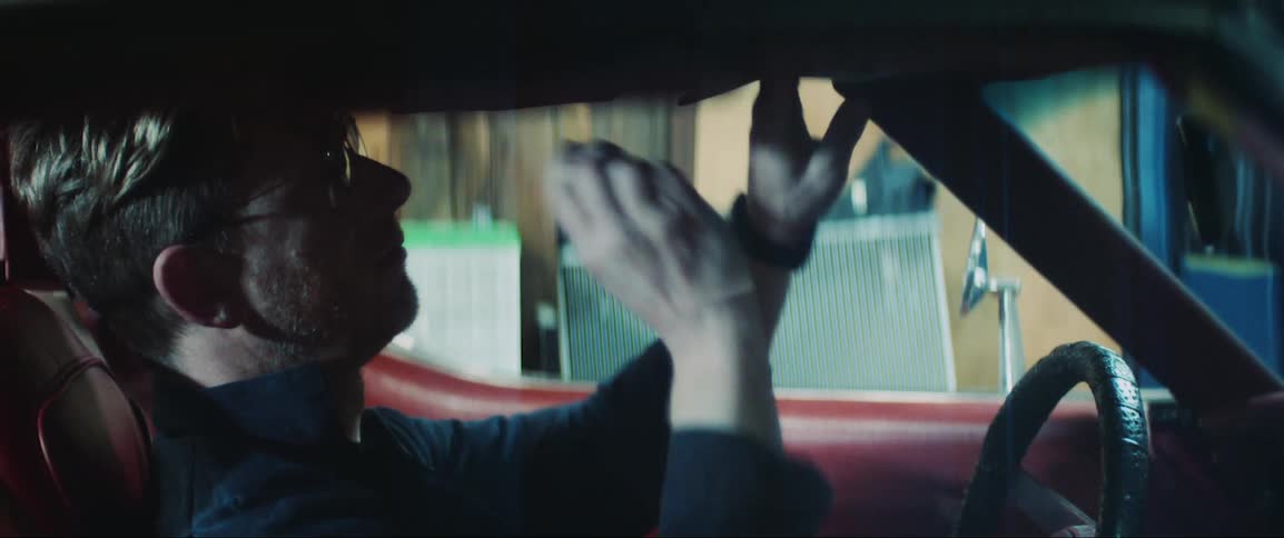 Portrait of a man trying to start the car but without success becoming frustrated
