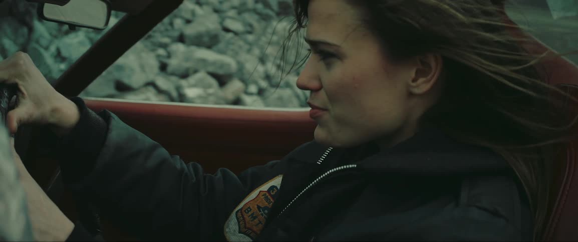 Portrait of a young woman performing a drift and with a happy facial expression