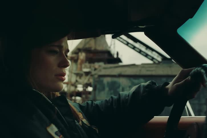 Portrait of a sad woman driving