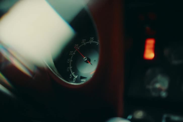Speedometer of a car with the pointer rotating