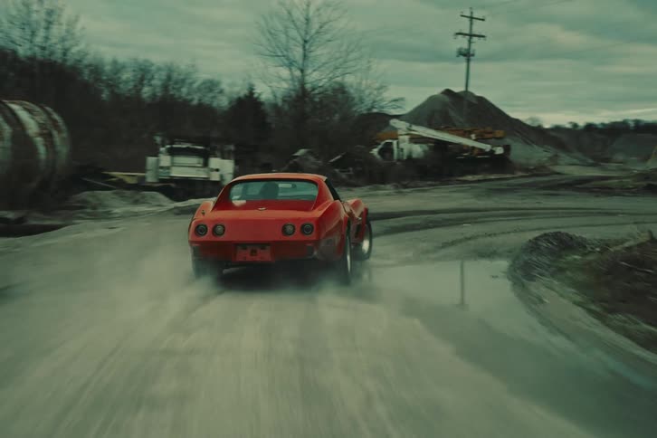 Panorama of a classic red sports car on a street