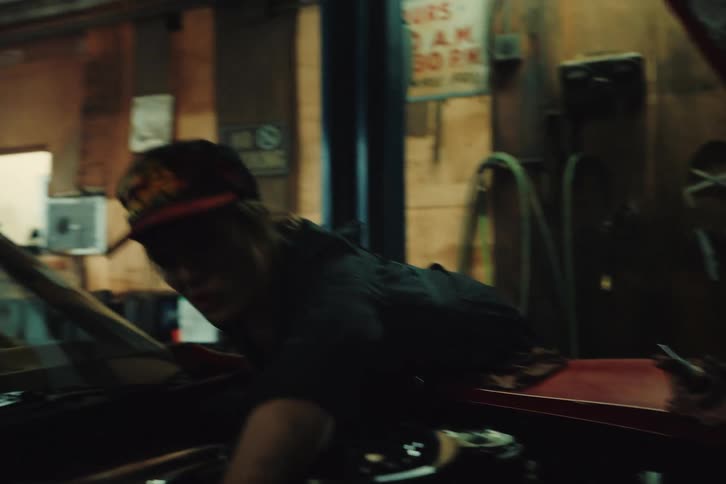 A mechanic changing car engine parts