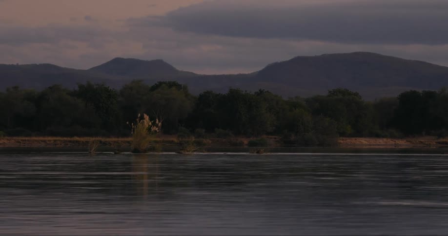 View of nature with a landscape of a lake and a mountain range on the horizon