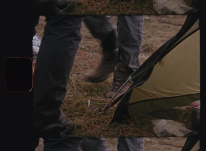 A foot clip of people in a camp