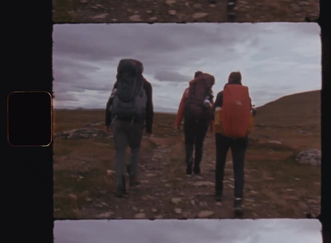 A clip of three hikers walking the mountain