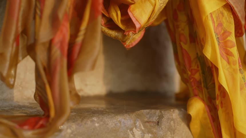 Wet clothes with water droplets falling