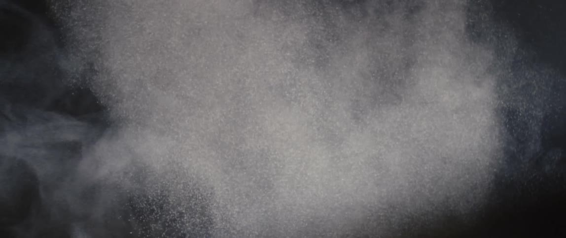 Abstract white powder in slow motion