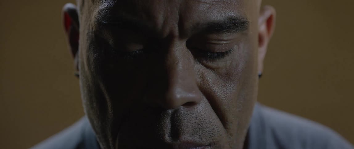 Portrait of a man with closed eyes in concentration