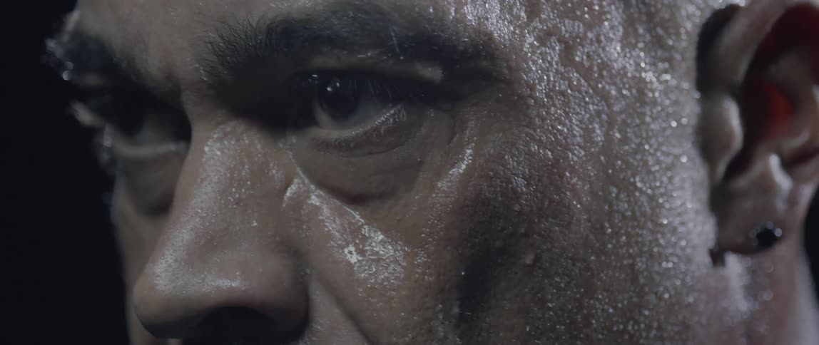 Portrait of a whole man soaked with a facial expression of concentration