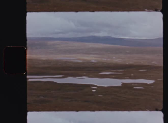 A clip of a plane mountainous land