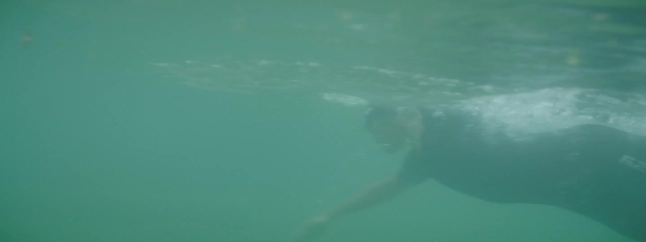 A clip of a man swimming the sea