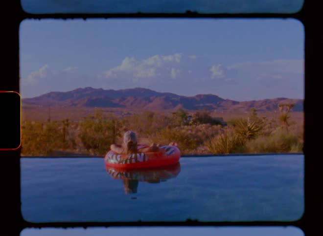 A person is floating on a inner tube