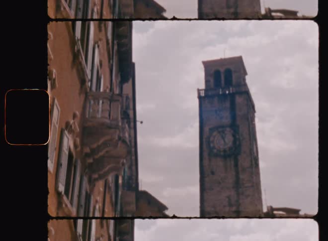 View of a tower in the middle of a neighborhood with historic buildings