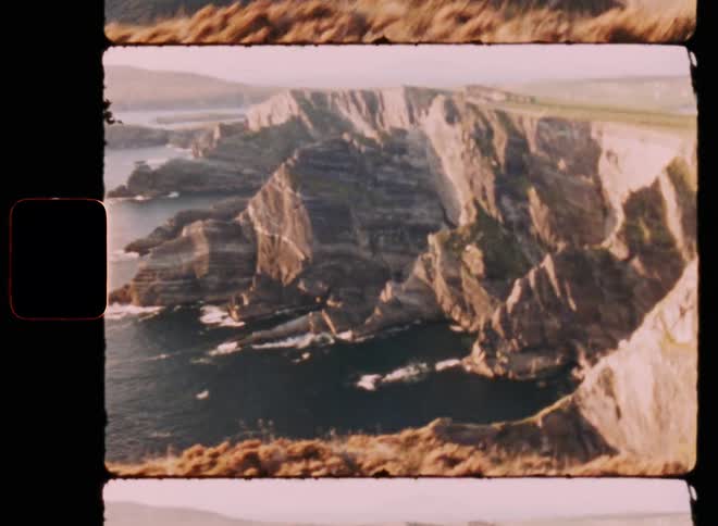 Rocky sea coast during sunny day