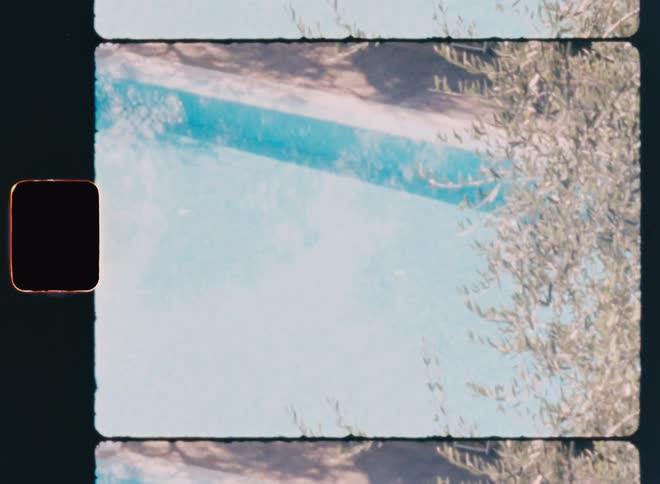 View of a clean swimming pool with clear water in the daylight