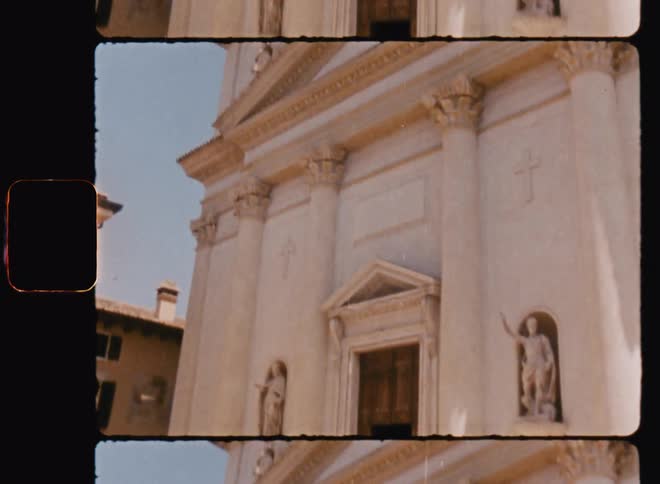 A cathedral with classical architecture with sculptures of angels