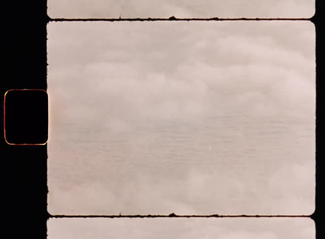 Aerial over fluffy whitelight gray clouds