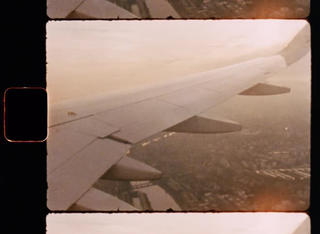 Wing of an airplane moving in the air during the day