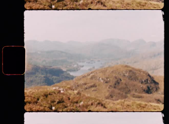 A path on top of a hill overlooking several other lower hills