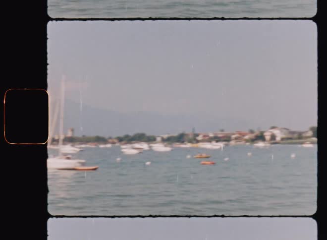 Several boats sailing on the water