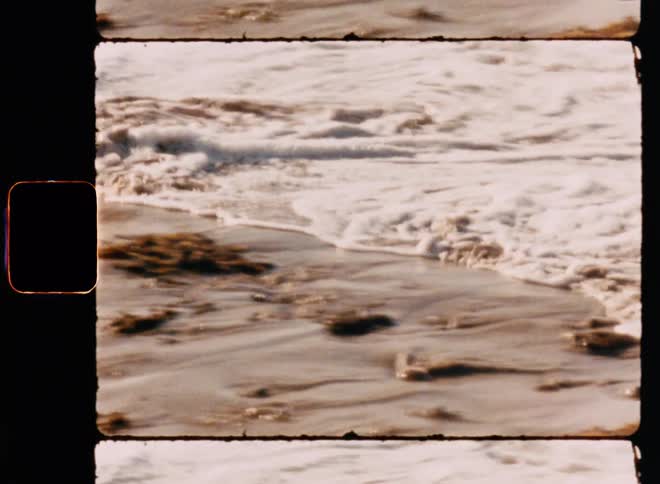 Flowing sea water by the beach side