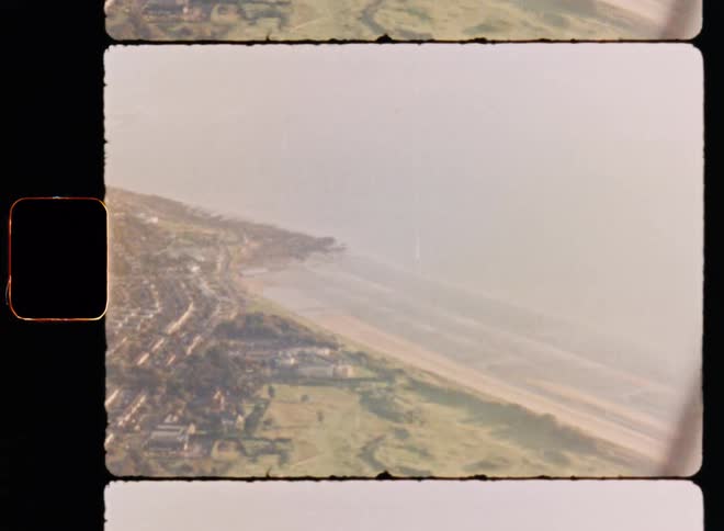 Aerial view of a beach and waterfront buildings