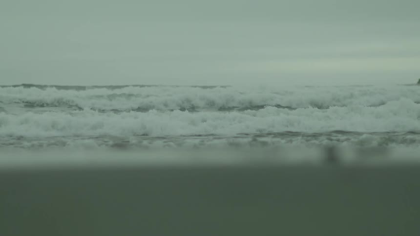Raging waves of rough sea during the day
