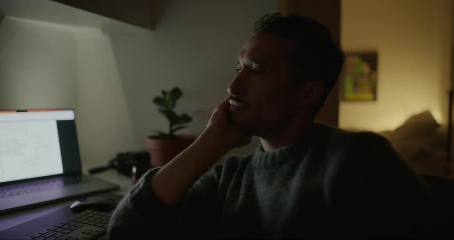 A man working in his home office at home