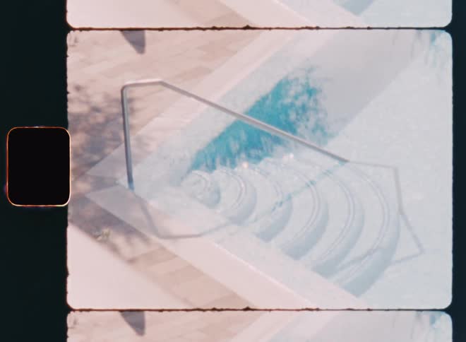 View from the window of a swimming pool with clear water